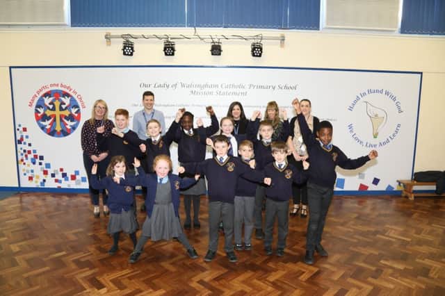 Staff and pupils at Our Lady of Walsingham are celebrating being in the top three per cent of schools for progress between KS1 and KS2 NNL-190314-164657005