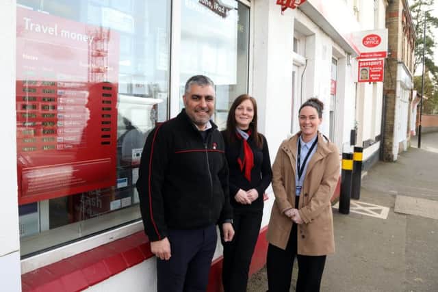 Thrapston postmaster Ricky Ghuman, supervisor Sue Keeble and  Post Office Network Sales Support Manager Nicola Handscombe with the new travel currency rate board. Picture: Alison Bagley NNL-190315-203448005