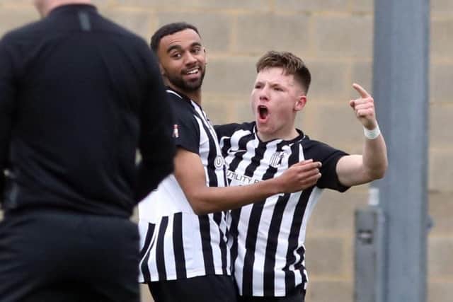 Hat-trick hero Jordon Crawford celebrates the first of his three goals in Corby Town's 5-2 victory over North Leigh at Steel Park. Pictures by Alison Bagley
