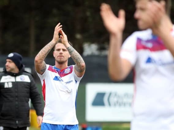 Declan Rogers, who scored AFC Rushden & Diamonds' first goal, applauds the fans after they completed a 2-1 victory over Needham Market. Pictures by Alison Bagley