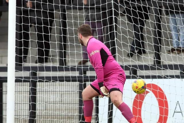 Joel Carta's shot finds the net to give Corby the lead