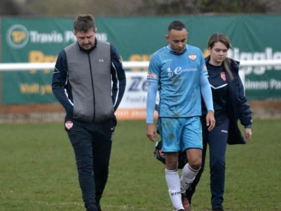 Boss Marcus Law and Rhys Hoenes show their disappointment after Kettering Town suffered a 1-0 defeat at Biggleswade Town. Pictures by Eden Palmer