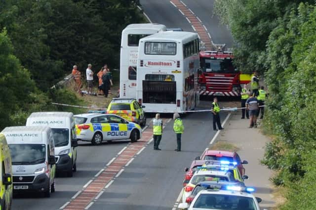 The emergency services at the scene of the bus crash between Desborough and Rothwell NNL-181207-103116001
