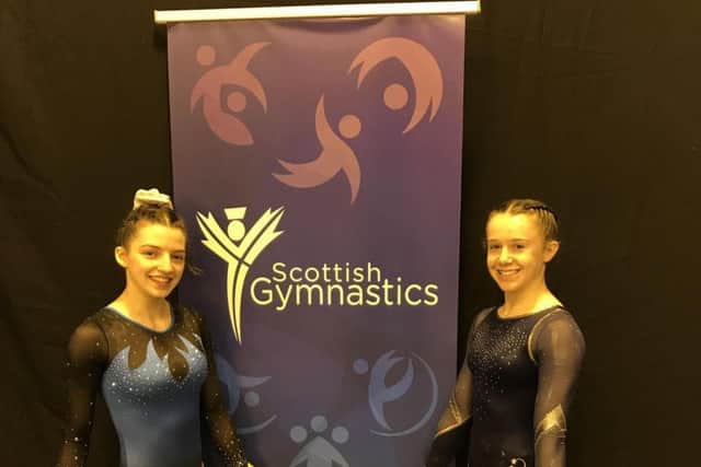 Kettering Olympic Gymnastics Club members Naomi Wright (left) and Kallie Walker returned from the Scottish National Championships with a bronze and gold medal respectively