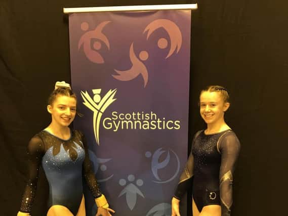 Kettering Olympic Gymnastics Club members Naomi Wright (left) and Kallie Walker returned from the Scottish National Championships with a bronze and gold medal respectively