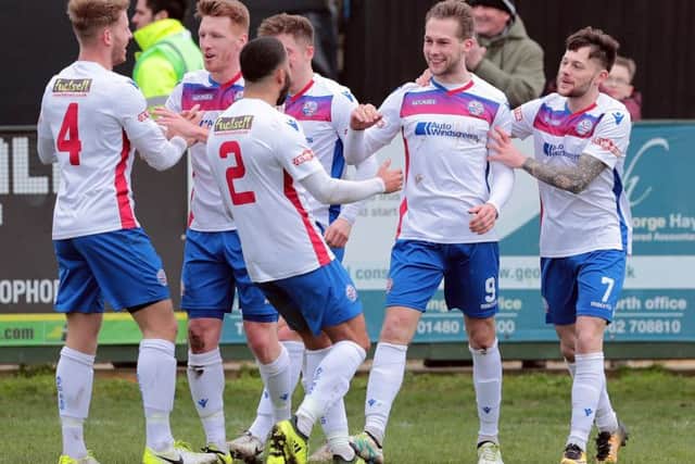 Jack Bowen takes the congratulations after he scored what proved to be the winner in AFC Rushden & Diamonds 2-1 victory over Needham Market at Hayden Road last weekend. Picture courtesy of Malcolm Swinden Photography