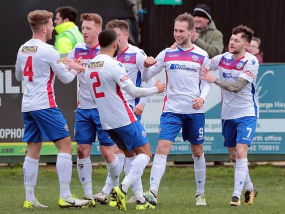 Jack Bowen takes the congratulations after he scored what proved to be the winner in AFC Rushden & Diamonds 2-1 victory over Needham Market at Hayden Road last weekend.  Picture courtesy of Malcolm Swinden Photography