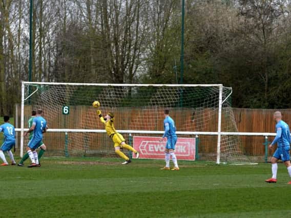 Paul White made this superb early save at Biggleswade Town last weekend but Kettering Town still slipped to a 1-0 defeat. Picture by Eden Palmer