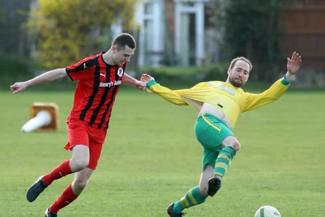 Action from Alfred Street as Irchester United and Holwell Sports shared a goalless draw