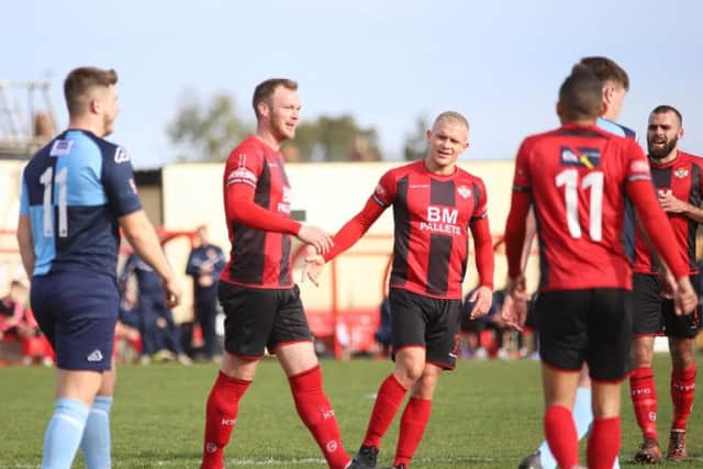 Declan Towers enjoys the moment after he headed home Kettering Town's second goal in their 2-0 success over St Neots Town at Latimer Park. Pictures by Peter Short