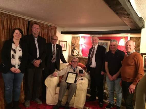 The local football community will be out in force to pay tribute to Bo Patrick this evening following his death last week. Bo is pictured receiving his 50-year service award from the Football Association in 2017