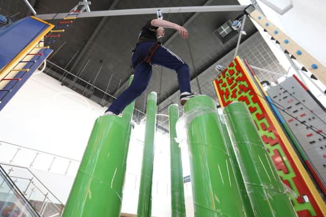 This staff member was one of the first to have a go on the stairway to heaven which was unwrapped yesterday