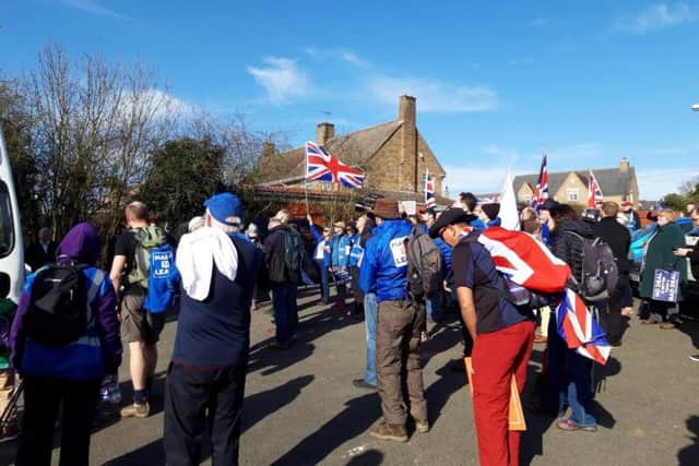 Leavers congregate outside the village hall.