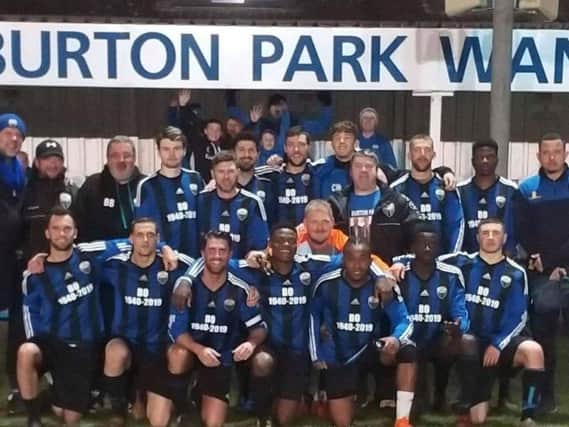 The Burton Park Wanderers squad were joined by Bo Patricks son and club chairman Mark (far left) as they posed for the camera following their 2-0 win over Sileby Rangers in their first home match since the passing of the club stalwart