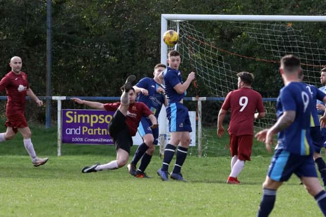 Goalmouth action from Thrapston Venturas 5-0 victory over Spratton Reserves in Division Three. Picture by Alison Bagley