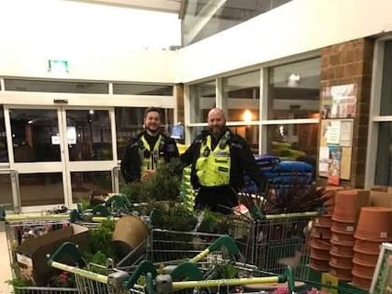 PC Bristow and PC Wilson return the stolen items