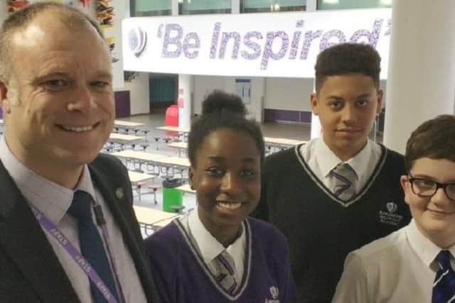 Principal Andy Burton with pupils from Kingswood Secondary Academy