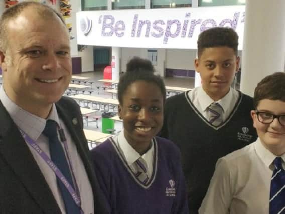 Principal Andy Burton with pupils from Kingswood Secondary Academy
