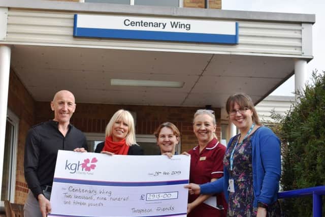 Keith and Tracey visited the wing to hand over the cheque.