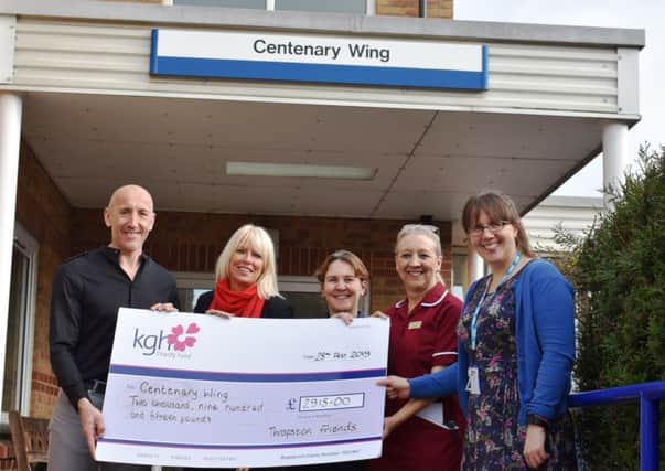 Keith and Tracey visited the wing to hand over the cheque.