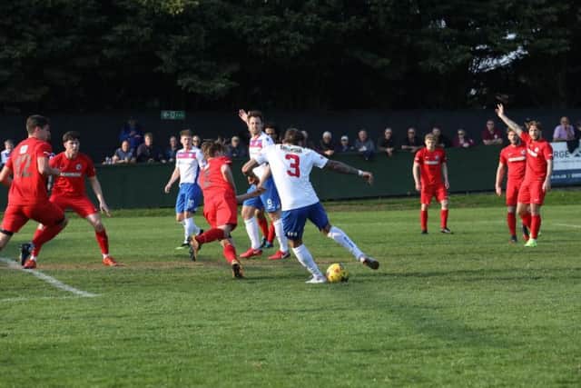 Action from the goalless draw between AFC Rushden & Diamonds and Royston Town