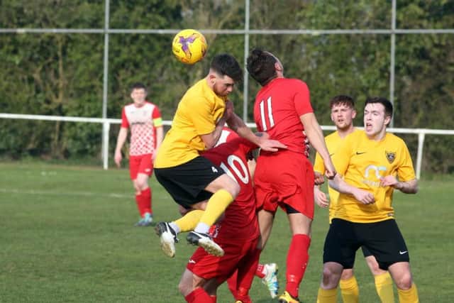 Action from Rothwell Corinthians' 1-1 draw with Harborough Town in the UCL Premier Division. Pictures by Alison Bagley