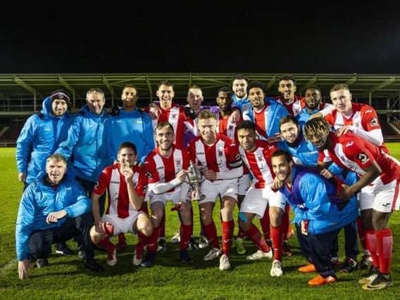 Brackley Town show off the NFA Hillier Senior Cup after their win at Sixfields. Pictures by Kirsty Edmonds