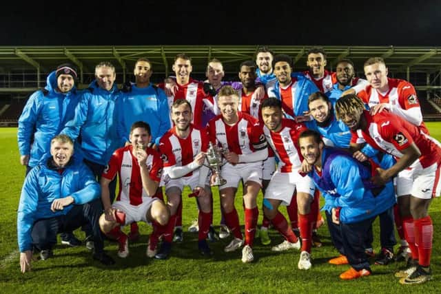 Brackley Town show off the NFA Hillier Senior Cup after their win at Sixfields. Pictures by Kirsty Edmonds