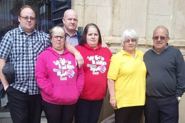 The Stanton-Watts family outside court NNL-190404-224917005