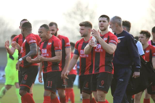 The Kettering Town players put one hand on the Evo-Stik League South Premier Division Central title last weekend and now they are hoping to finish the job at Latimer Park tomorrow. Picture by Peter Short