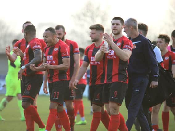 The Kettering Town players put one hand on the Evo-Stik League South Premier Division Central title last weekend and now they are hoping to finish the job at Latimer Park tomorrow. Picture by Peter Short