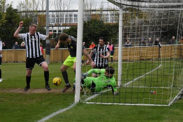 Goalmouth action from AFC Rushden & Diamonds' 0-0 draw at St Ives Town. Picture courtesy of HawkinsImages