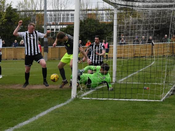 Goalmouth action from AFC Rushden & Diamonds' 0-0 draw at St Ives Town. Picture courtesy of HawkinsImages