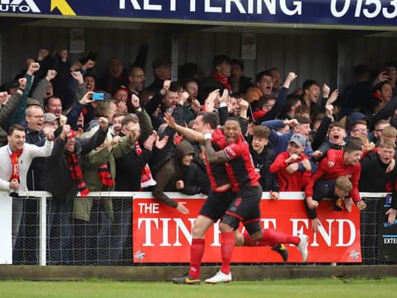 Craig Stanley celebrates with Aaron OConnor but the defenders first goal for Kettering Town proved to be in vain as their title celebrations were put on hold after a 2-1 defeat to Alvechurch last weekend. Picture by Peter Short