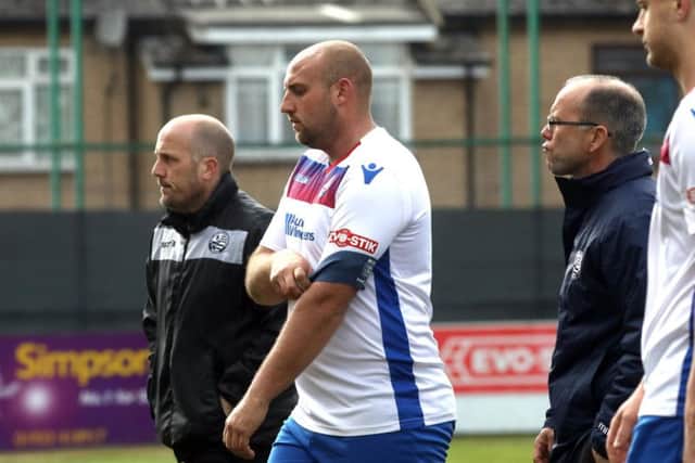 Assistant-manager Paul Lamb, captain Liam Dolman and manager Andy Peaks cut frustrated figures after the final whistle as AFC Rushden & Diamonds were beaten 2-1 by Stourbridge at Hayden Road. Pictures by Alison Bagley