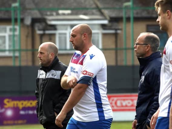 Assistant-manager Paul Lamb, captain Liam Dolman and manager Andy Peaks cut frustrated figures after the final whistle as AFC Rushden & Diamonds were beaten 2-1 by Stourbridge at Hayden Road. Pictures by Alison Bagley