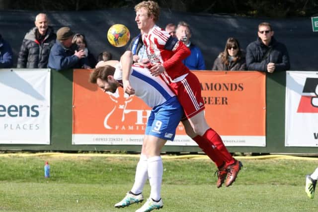 Tom Lorraine is challenged by a Stourbridge defender during Diamonds' defeat