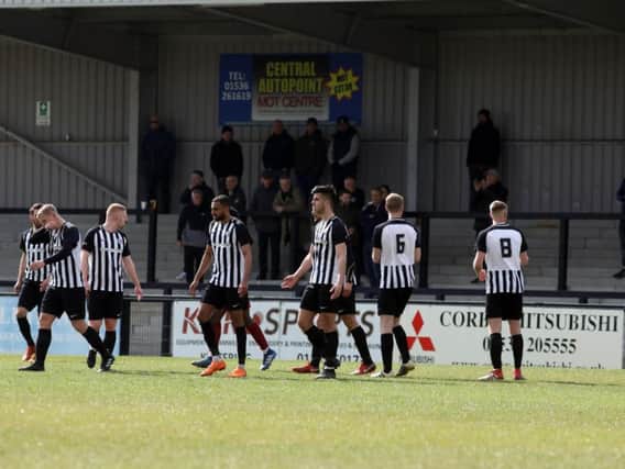 Corby Town's players look dejected after they conceded one of the goals in their 4-1 home defeat to Welwyn Garden City. Pictures by Alison Bagley
