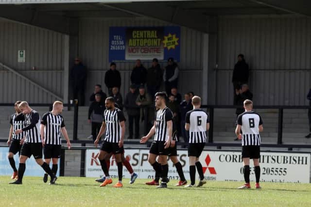 Corby Town's players look dejected after they conceded one of the goals in their 4-1 home defeat to Welwyn Garden City. Pictures by Alison Bagley