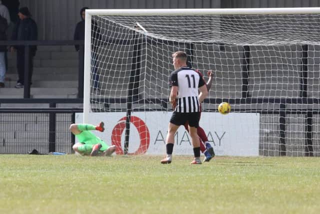 Steelmen goalkeeper Dan George is beaten for the first of Welwyn Garden City's four goals