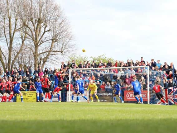 Kettering Town secured promotion in front of a large travelling support at Halesowen Town. Picture by Peter Short