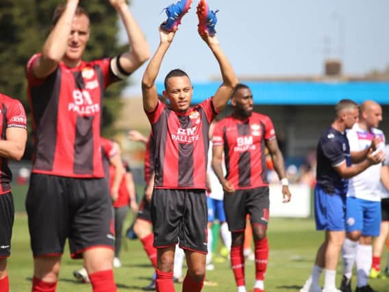 Kettering Town's players will hope to finish their promotion-winning campaign on a high note when they host Stratford Town tomorrow. Picture by Peter Short