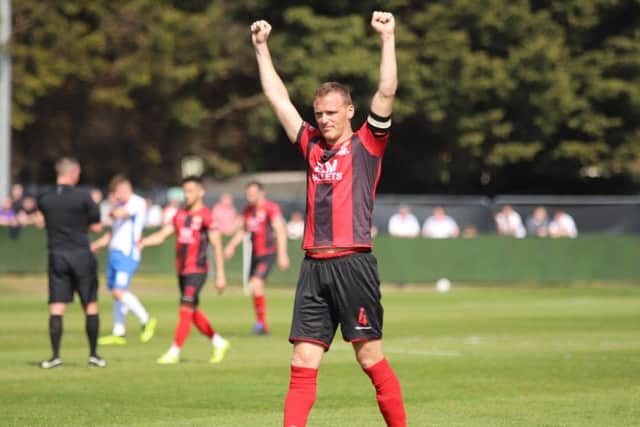 Brett Solkhon and his Kettering Town team-mates were able to enjoy a job well done as they claimed a 1-0 win at AFC Rushden & Diamonds. Pictures by Peter Short