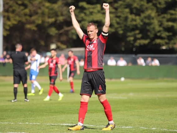 Brett Solkhon and his Kettering Town team-mates were able to enjoy a job well done as they claimed a 1-0 win at AFC Rushden & Diamonds. Pictures by Peter Short