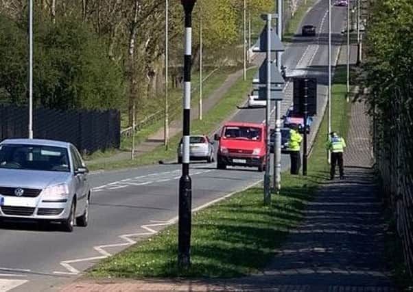 Officers carry out speed checks.