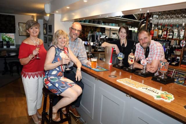 Pub re-opens: Isham: The Lilacs pub, re-opened after a huge community effort to renovate the last remaining pub in the village. 
l-r Heather Davis, John Davis and Michele Mott - directors with landlady and landlord Katie and Peter
Wednesday, 24th April 2019 NNL-190424-205401009