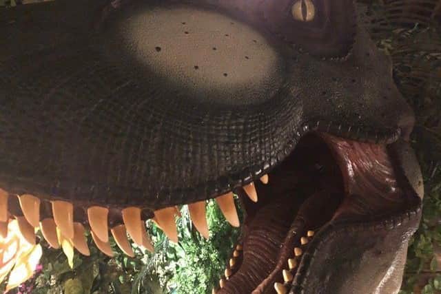 One of the lifelike dinosaurs at the new Jurassic Grill in Kettering NNL-190425-211253005