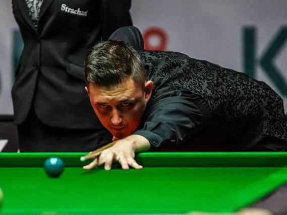 Kyren Wilson booked his place in the second round of the Betfred World Championship