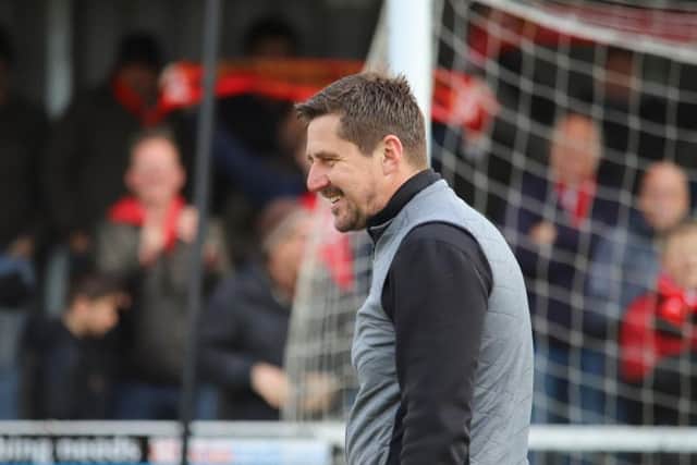 Marcus Law was all smiles after Kettering Town completed their title-winning season with a 5-1 victory over Stratford Town at Latimer Park. Pictures by Peter Short