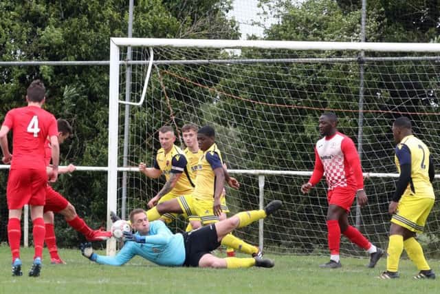 Goalmouth action from Rothwell Corinthians' 2-1 success over Whitworth. Picture by Alison Bagley
